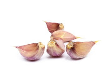 Fresh garlic cloves isolated on white background