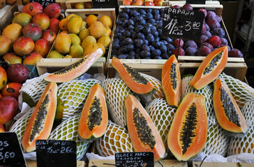 Papaya, mango, plum on the market