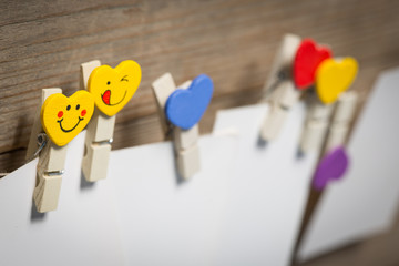 card on clothespins hanging on the rope