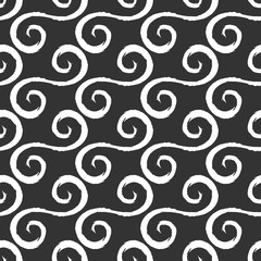 White curlicues drawn with a rough brush. Black background. Seam