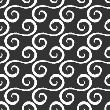 White curlicues drawn with a rough brush. Black background. Seam