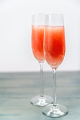 Two glasses of bellini cocktail