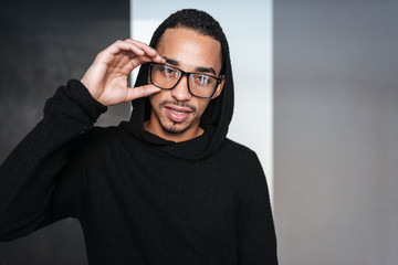 Obraz premium Portrait of attractive african american young man in glasses