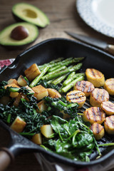 Fried plantain, asparagus, potatoe spinach and kale with avacado