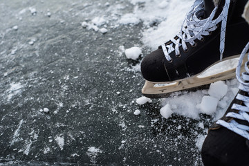 hockey scates on ice pond riwer