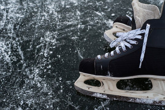 hockey scates on ice pond riwer