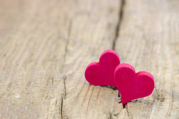Fototapeta premium red hearts on wooden background
