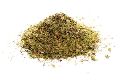 Pile of dried oregano leaves isolated on white background