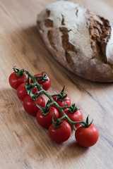loaf of bread with cherry tomatoes