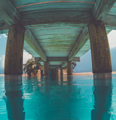 Pool with a Wooden bridge
