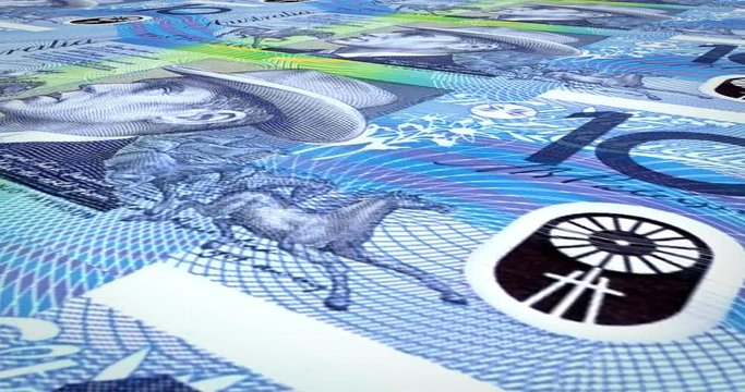Series of banknotes of ten australian dollars rolling on screen, coins of the world, cash money, loop