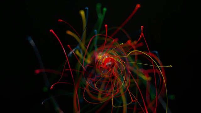 Rainbow swirl of abstract colors of paint fling from center, alpha matte