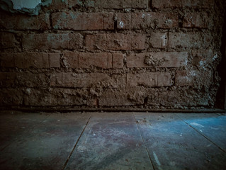 Dirty, scratched old brick wall, soft focus