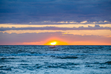 Obraz premium Cloudy sunset over Baltic sea