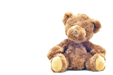 Brown teddy bear doll isolated on white background.