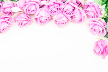 Valentines day violet roses top view flat lay border with heart and copy space