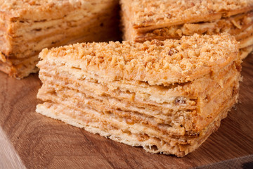 Piece of Cake Napoleon close up on a wooden board