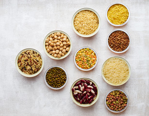 Many different vegan ingredients on a white background top view 