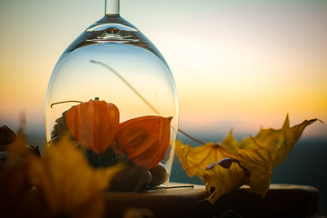 Autumn glas with maple leaf. vitage style image