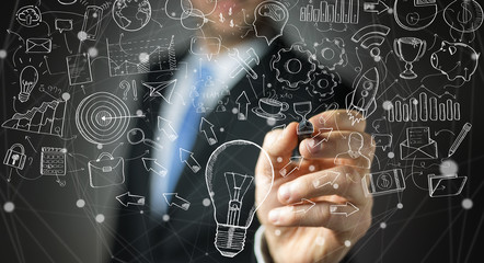 Businessman drawing manuscript project presentation with a pen