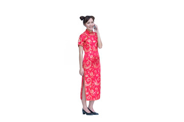 Asian women wear red dress chinese style cheongsam and talk phon