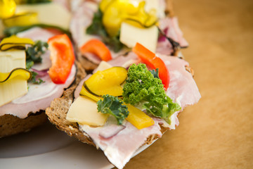 close up on Fresh healthy sandwich with ham, lettuce, paprika, a