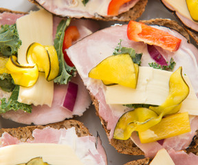 close up on Fresh healthy sandwich with ham, lettuce, paprika, a