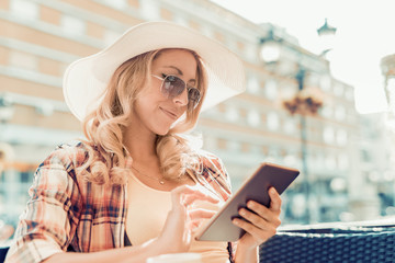 Woman using digital tablet