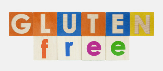 GLUTEN FREE spelled out with toy blocks. Isolated.