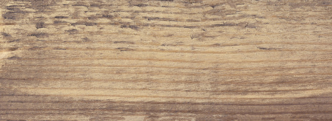 Brown scratched wood texture with natural pattern. Wooden background 