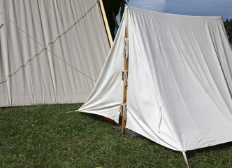 white tents in a camp