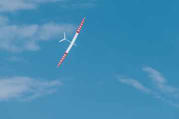 RC soaring plane on blue sky
