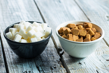 Brown and white sugar cubes.