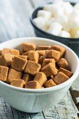 Brown and white sugar cubes.