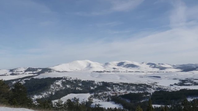 Beautiful nature of mountain region in western Serbia 4K 2160p 30fps UltraHD footage - Zlatibor tourist resort with snowed hills 3840X2160 UHD video 
