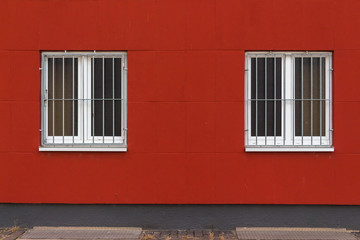 Red Wall with Two Windows protected by Gratings 
