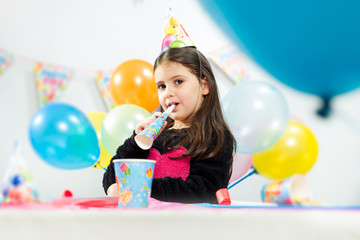 Fototapeta na wymiar Little girl celebrates birthday