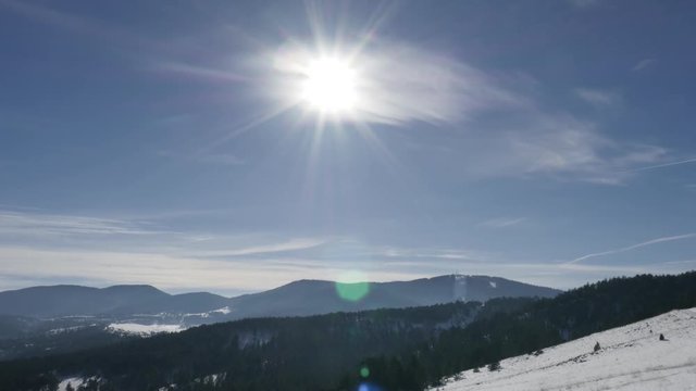 Western Serbia mountain region by winter 4K 2160p 30fps UltraHD tilting footage - Zlatibor tourist resort with snowed hills 3840X2160 UHD video 