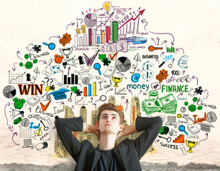 Young businessman daydreaming about success