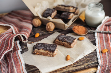 Homemade healthy snack sweets - energy nut bars. Sugar-free, gluten-free, without baking. Selective focus