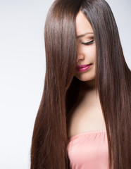 Naklejka premium young woman with long hair