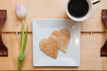 Romantic valentines day breakfast, love heart shape toast and co