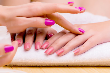 Woman hands during manicure procedure