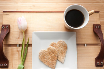 Romantic valentines day breakfast, love heart shape toast and co