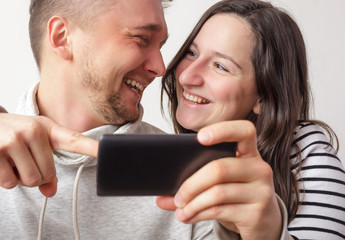 Young  loving couple makes selfie. Snapshot for memory