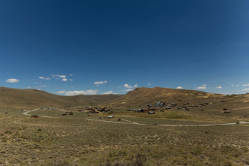 Clear blue sky over the abandoned gold rush town of Bodie, California