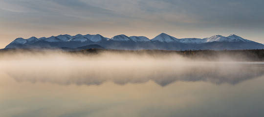 Kelly Lake, small lake which provide habitat for fish, birds, beavers and river otters with a small semi remote campsite. Alaska, USA.