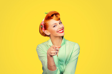 portrait of a beautiful woman pinup retro style pointing at you smiling laughing - obrazy, fototapety, plakaty