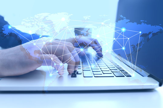 Modern technology concept. Man working with laptop at office