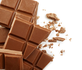 Broken chocolate bar on white background